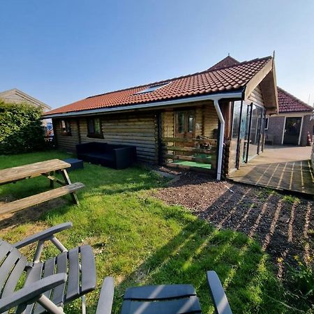 Finse Woning Op Camping De Tulpenweide Breezand Экстерьер фото